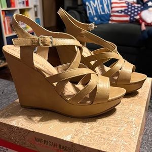 American Rag wedge sandals in size 8w.  Brand new shoe in the color Tan.